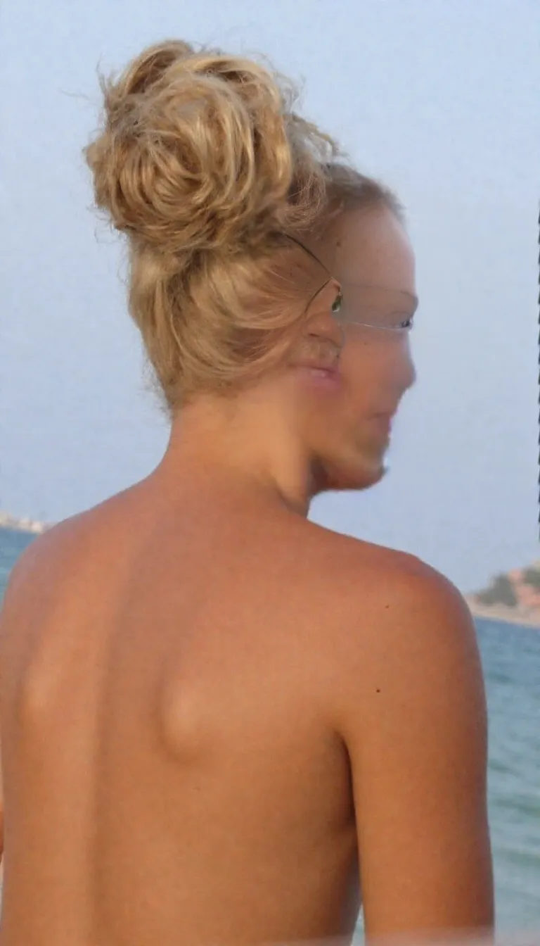 Fully naked skinny fit body 19 year old girl smiling blonde braided hair hyper realistic perfect photograph fit body
At a nudist beach naturist family